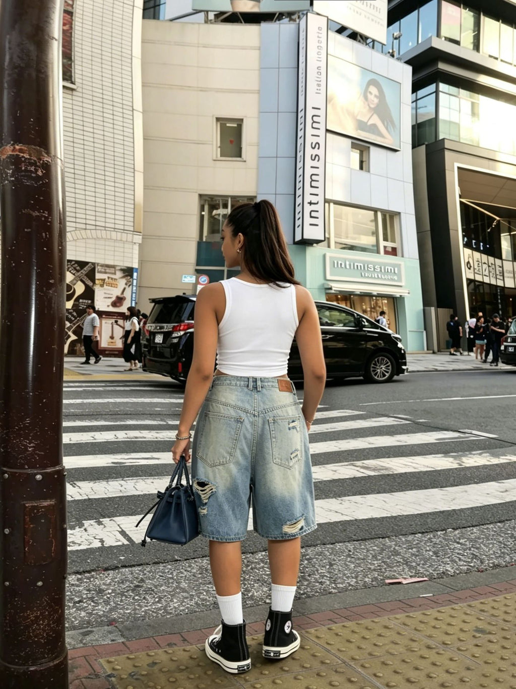 Women Ripped Washed Denim Bermuda Shorts