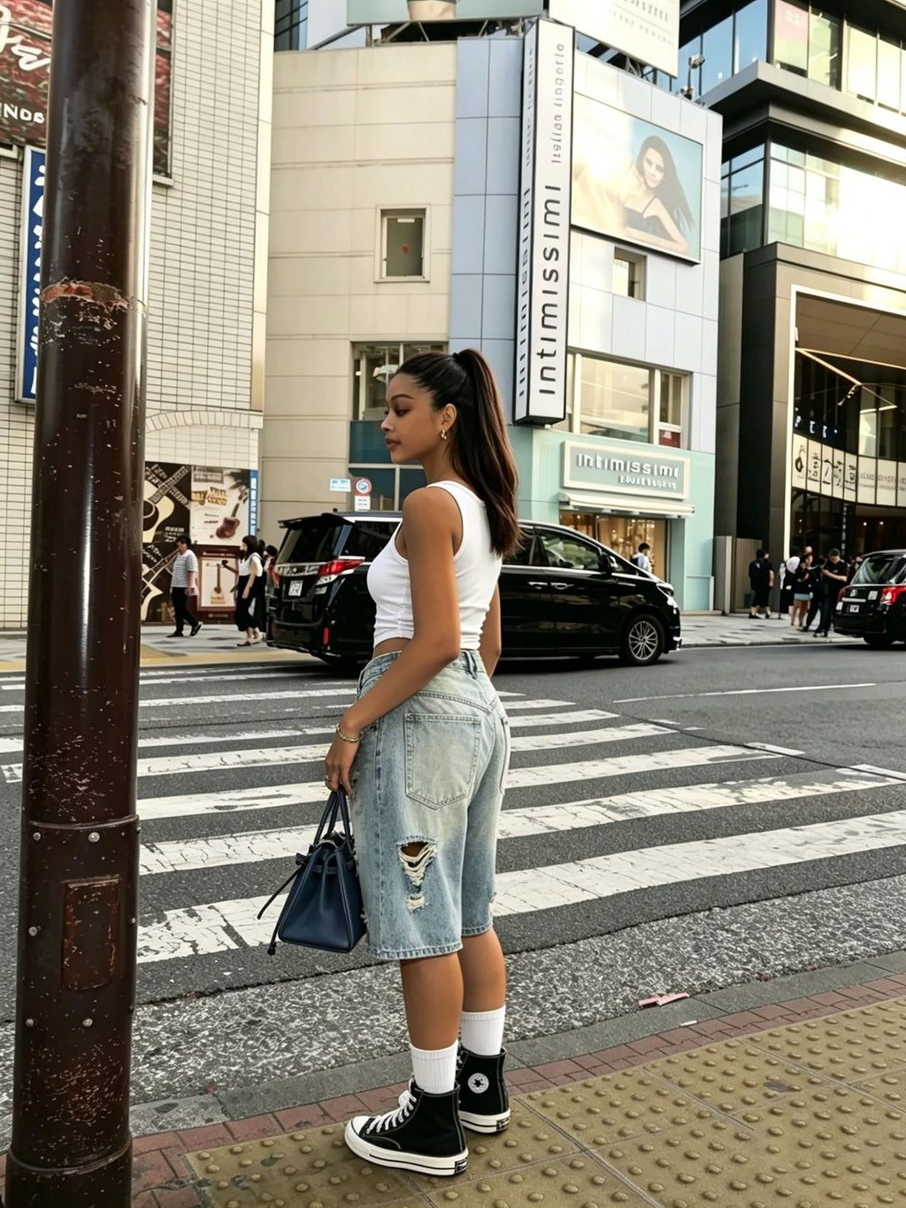 Women Ripped Washed Denim Bermuda Shorts